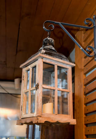 Sketch of street light , lamppost , candlestick. Wooden street lights lamp post lanterns deserted road. Old street light with candle on the wallの写真素材