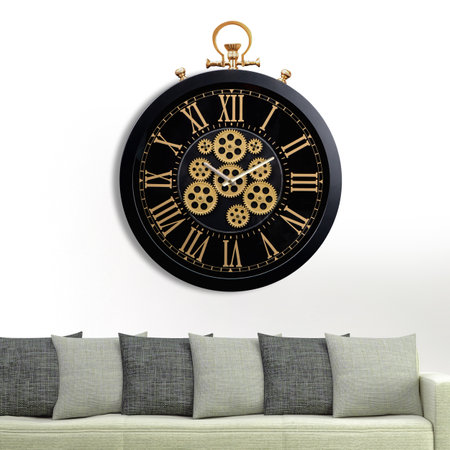 A large round indoor clock on the wall. Big clock on metal rack. Big clock hanging on white wall. Time concept. Antique clock hanging on the living room wallの写真素材
