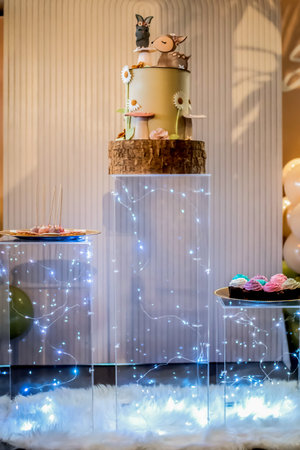 Happy Birthday! Children's decoration with glowing lights, birthday garland, different color of balloons. Decorated photo zone. Festive decorative elements, photo areaの写真素材