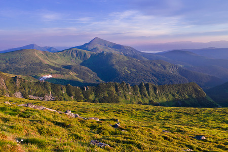 Panorama of the mountain range with Mount Goverla in the center against the sky with clouds. Carpathians.の写真素材