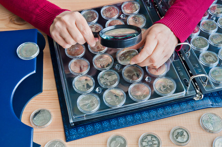 Coins for women in capsulesの写真素材