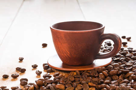 Cup of coffee on a wooden tableの写真素材