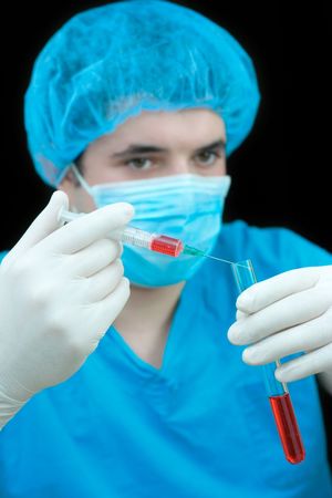 Medical worker examining a blood samples