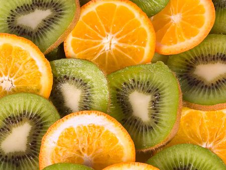 Kiwi and oranges close upの写真素材