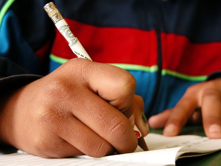 Schoolboy doing his homework
