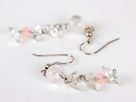 White earring against white backgroundの写真素材