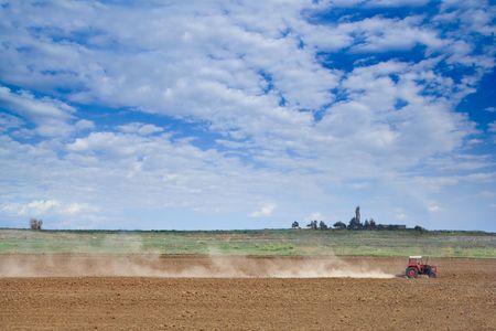 Farmer plowing the soil in countryside, Macedonia
