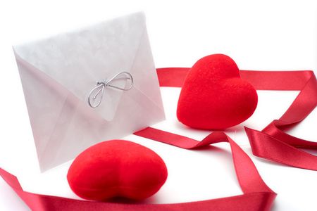 Letter, red stripe and two hearts against white background