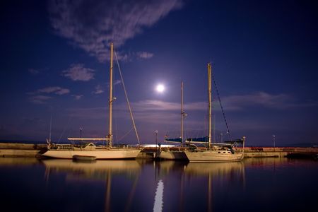Boats tied at a pier on Corfu island, Greeceの写真素材