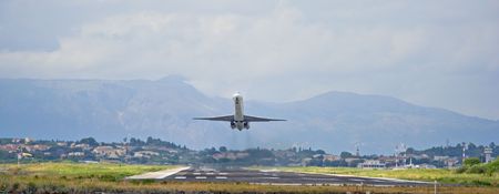 Passenger plane taking off from Corfu island airportの写真素材