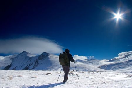 Climber going to the top of the mountain