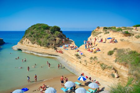 People at the Canal d’ amour beach on Corfu island, Greece
