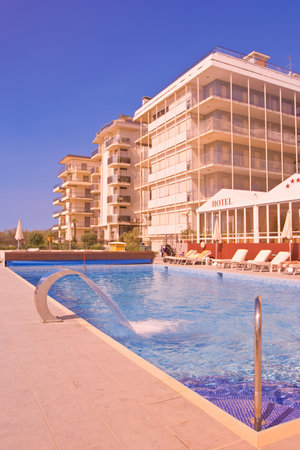 Swimming pool in a tourist resort Lido di Jesolo, Italyのeditorial素材