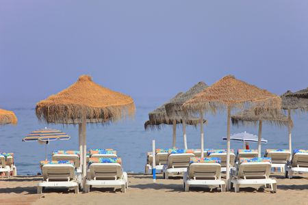 Beach beds at Los Boliches beach, Fuengirola, Spainの写真素材