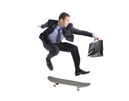 A businessman with skateboard jumping isolated on a white backgroundの写真素材