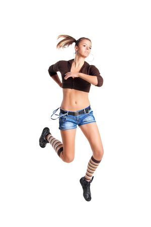 An attractive woman in a jump isolated on white backgroundの写真素材