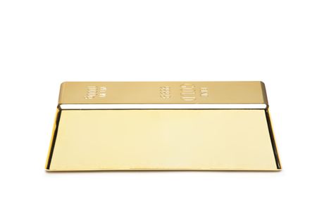 A gold bar isolated on white backgroundの写真素材