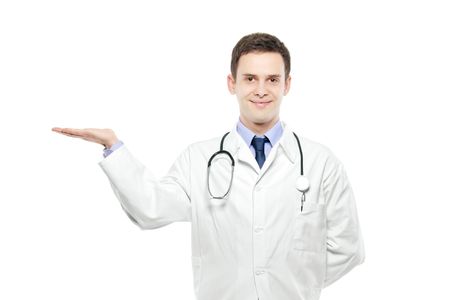 A young male doctor against white backgroundの写真素材