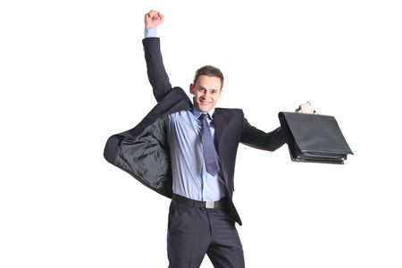A happy young businessman jumping in the air isolated on white backgroundの写真素材