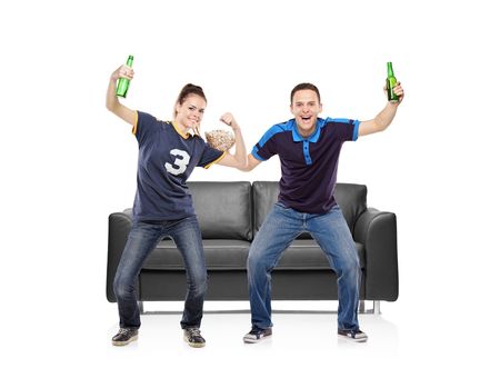 Excited boy and girl watching sportの写真素材