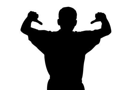 A silhouette of a sport fan with thumbs down isolated on whiteの写真素材
