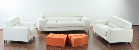 A studio shot of modern white sofa and a tableの写真素材