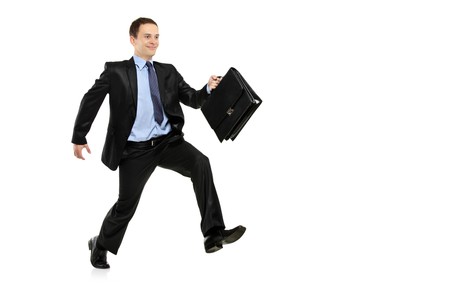 A view of a businessman running away against white backgroundの写真素材