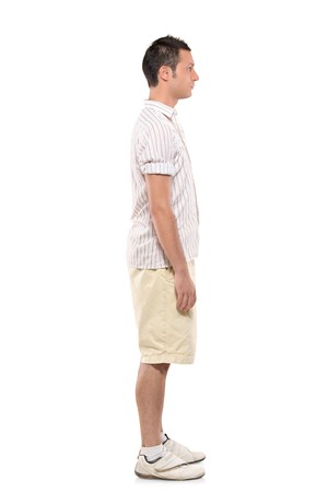 Full length portrait of a man standing in a line against white backgroundの写真素材
