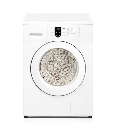 A washing machine full with money isolated on white background
の写真素材