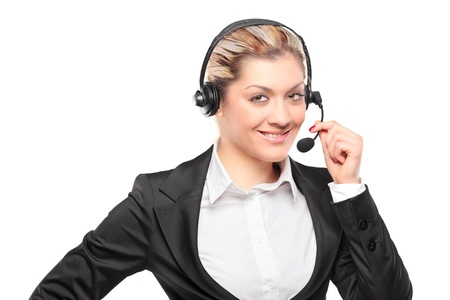 Portrait of a customer service operator wearing a headset isolated on white backgroundの写真素材