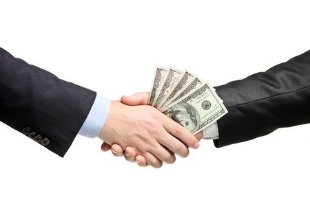 Handshake with money isolated on white backgroundの写真素材