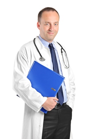 Smiling healthcare professional holding a folder of patient or medical information isolated on white backgroundの写真素材