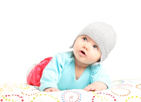 Cute little baby looking up isolated on white backgroundの写真素材
