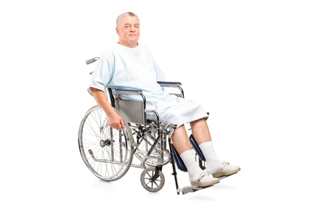 Male patient in a wheelchair isolated on white backgroundの写真素材