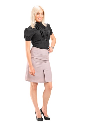 Full length portrait of an attractive woman posing isolated against white backgroundの写真素材