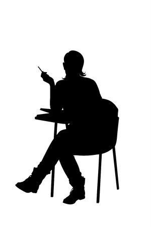 A silhouette of a young female sitting on a school chair isolated on white backgroundのイラスト素材