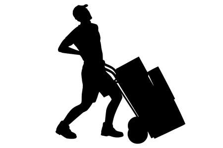 A silhouette of a full length portrait of a delivery boy, suffering from a back pain, pushing a hand truck isolated on white backgroundの写真素材