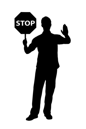 A silhouette of a full length portrait of a man gesturing and holding a traffic sign stop isolated on white backgroundの写真素材