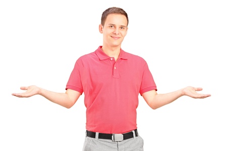 Handsome young man gesturing with his arms isolated on white backgroundの写真素材