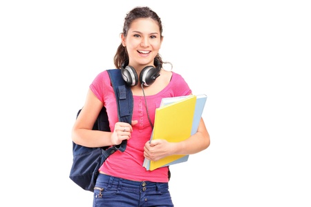 A female student with headphones isolated on white backgroundの写真素材