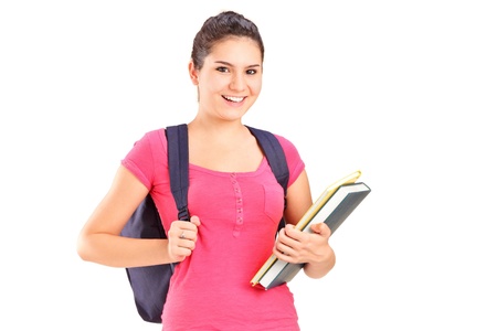 A female student holding books isolated on whiteの写真素材