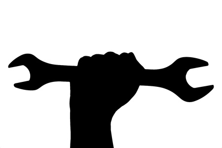 A silhouette of a hand holding a wrench isolated on white backgroundの写真素材