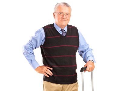 A mature man holding a suitcase, isolated on white backgroundの写真素材