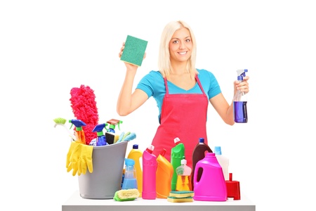 Young female cleaner with cleaning equipment isolated on white backgroundの写真素材