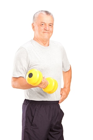 A mature man lifting a dumbbell isolated on white backgroundの写真素材