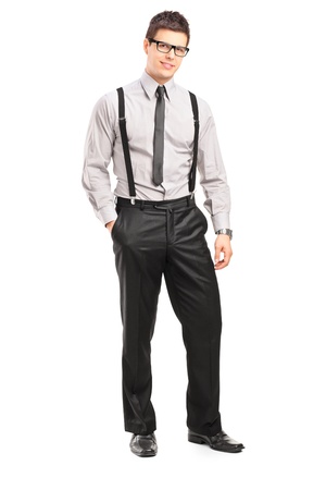 Full length portrait of a stylish smiling man posing isolated against white backgroundの写真素材