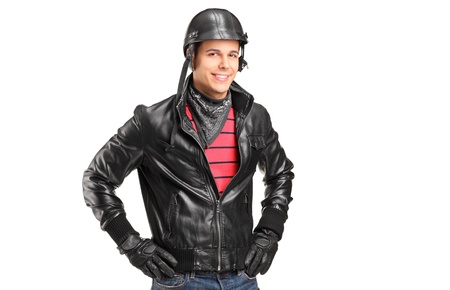 A motorcycler with helmet posing isolated on white backgroundの写真素材