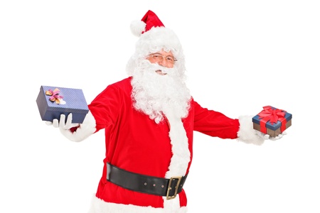 A Santa Claus offering gifts isolated against white backgroundの写真素材