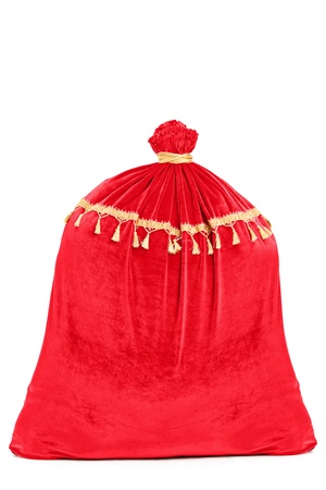 Tied Santa's bag full of presents isolated on white backgroundの写真素材