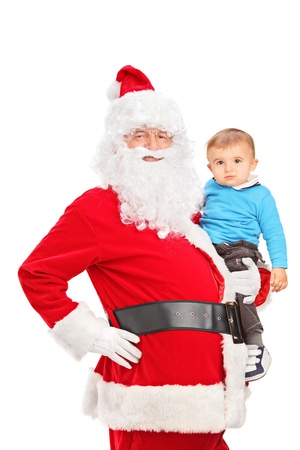 Santa Claus and small child posing isolated on white backgroundの写真素材